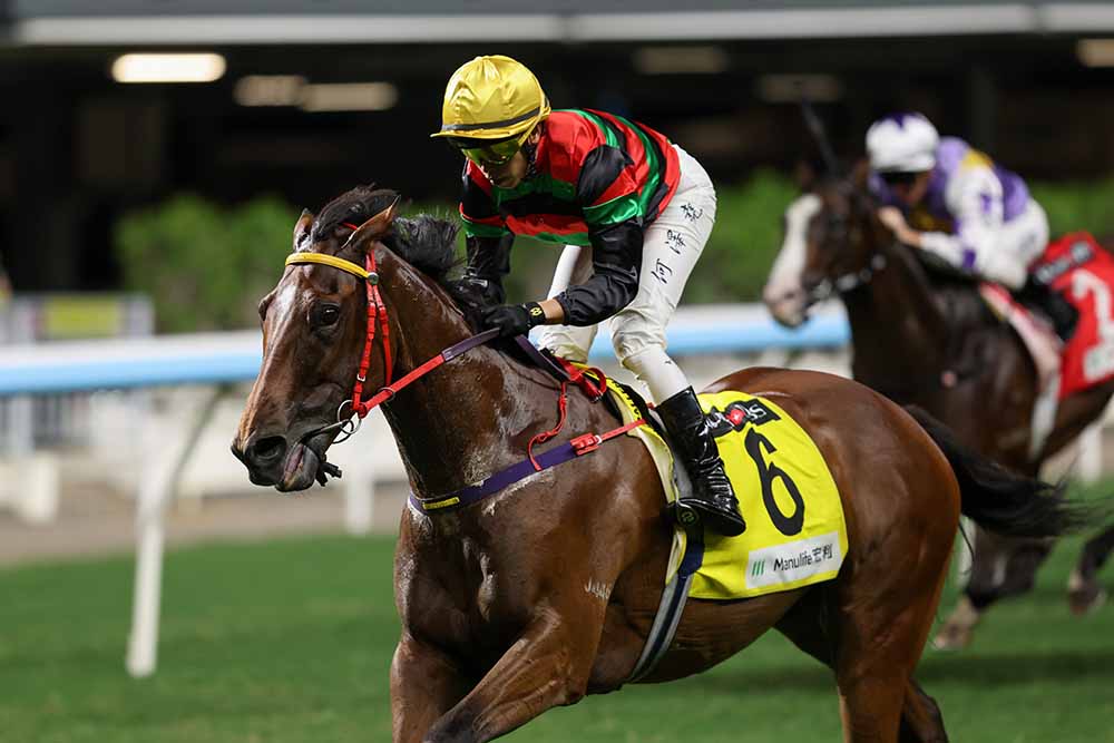 Vincent Ho drives Fortunate Son clear in the Class 3 Tai Hang Handicap.
